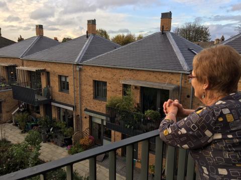 Janet looking out at the New Ground homes